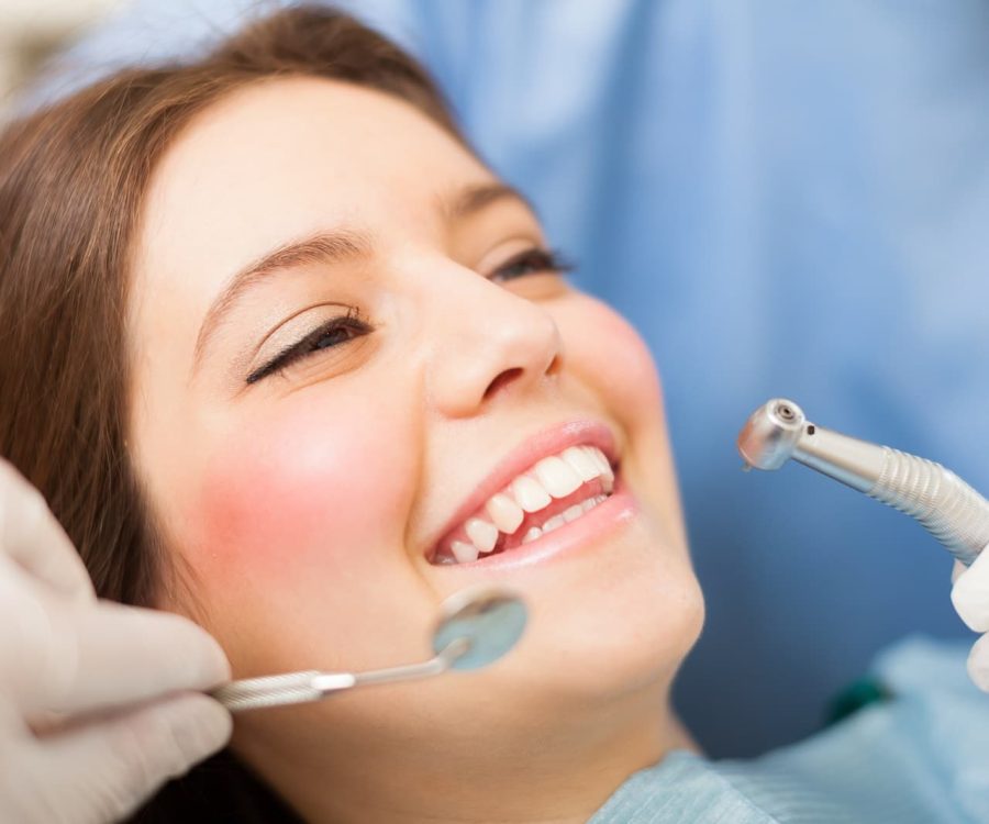 Woman receiving a dental treatment